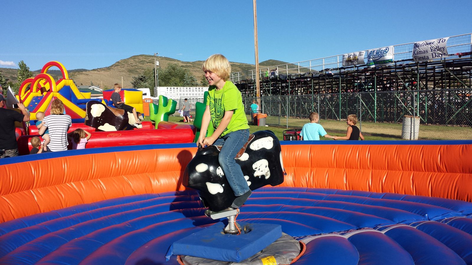 Grandson Jace working the Bull Bucking Machine at the Fiesta Day Celebration in Kamas Valley, Utah.