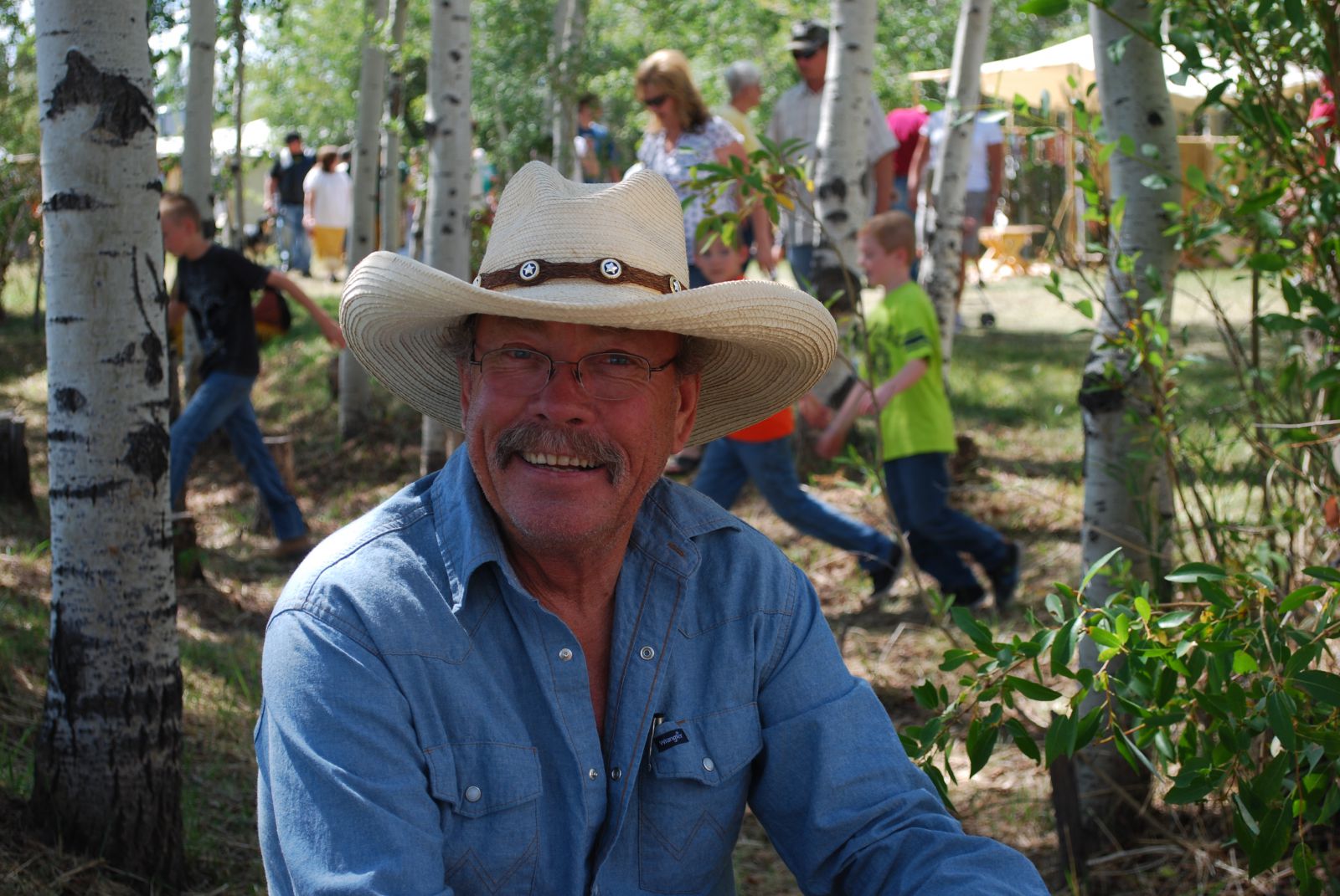 Enjoying Mountain Man Rendevous in Ft. Bridger, Wyoming. Only modern items allowed in camp are eyeglasses and cameras.