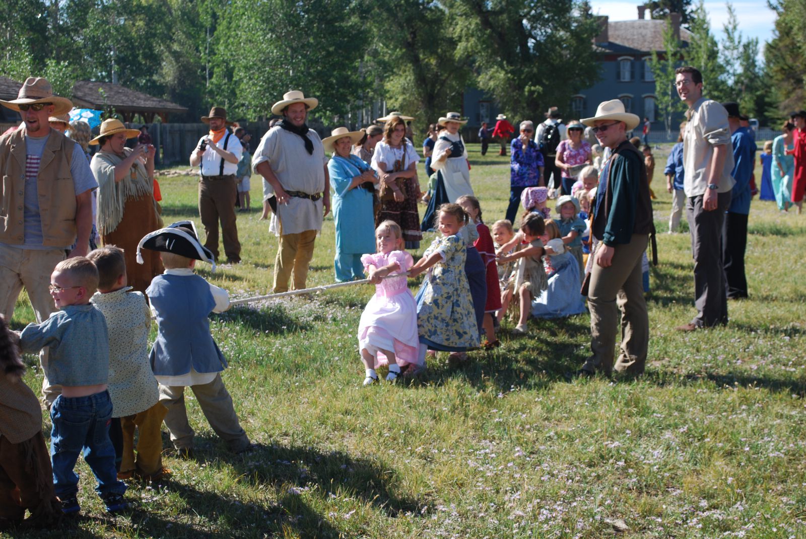 Kids ... and adults ... competing in the ever popular Tug-of-War competition at Mountain Man Rendeveous
